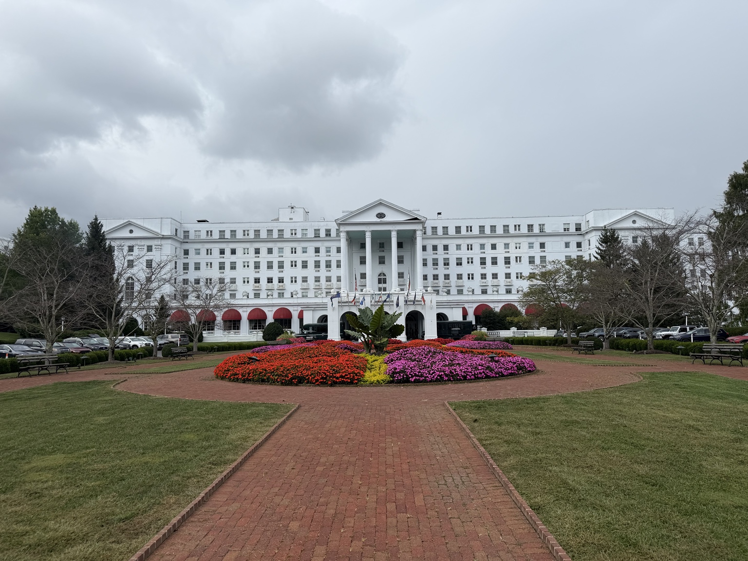 The Greenbrier hotel’s white facade and colorful flower gardens in White Sulphur Springs, West Virginia